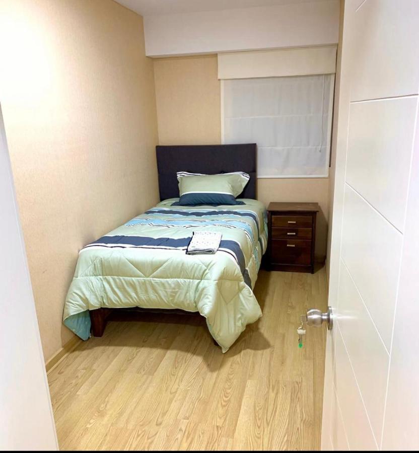 Séjour chez l'habitant Aurora Apartments- En Departamento Compartido